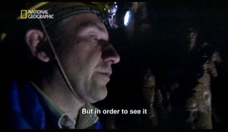 кадър от филм с пещерняк